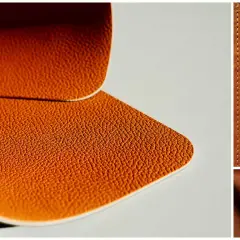 Gros plan sur des textures de cuir ou simili cuir marron, avec des détails de grain et de coutures.