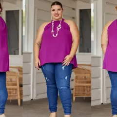 Une femme porte un haut violet et un jean skinny. Elle montre quel jean quand on a du ventre, un style flatteur et confortable.